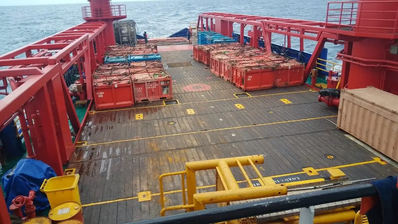 Marine waste skips on a supply vessel deck